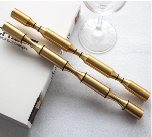 3bottle Al golden wine pegs